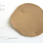 Tan felt circles cut for pita bread