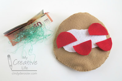 Euro bills, felt tomatoes and tzatziki, and Easter grass