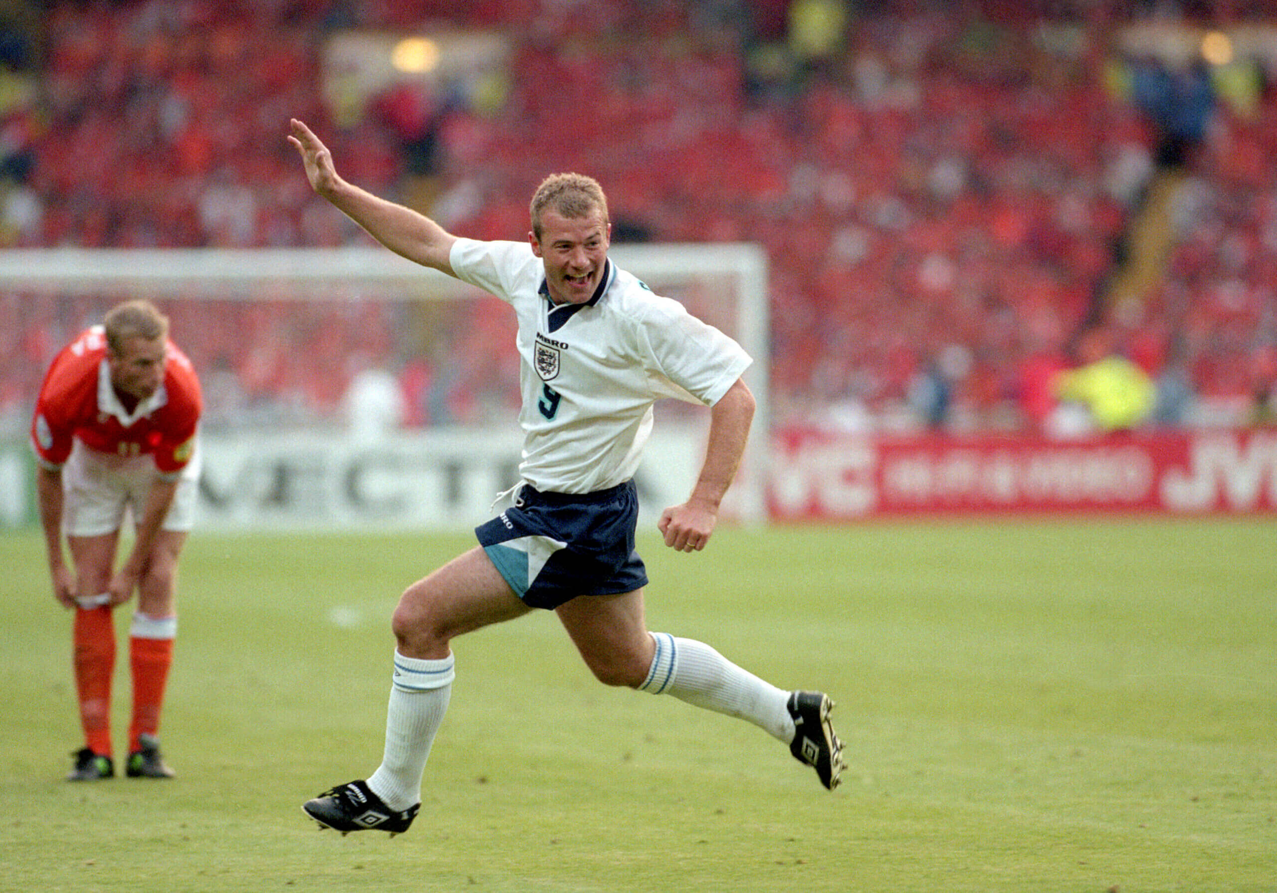 Alan Shearer celebrates scoring against the Netherlands in Euro 96