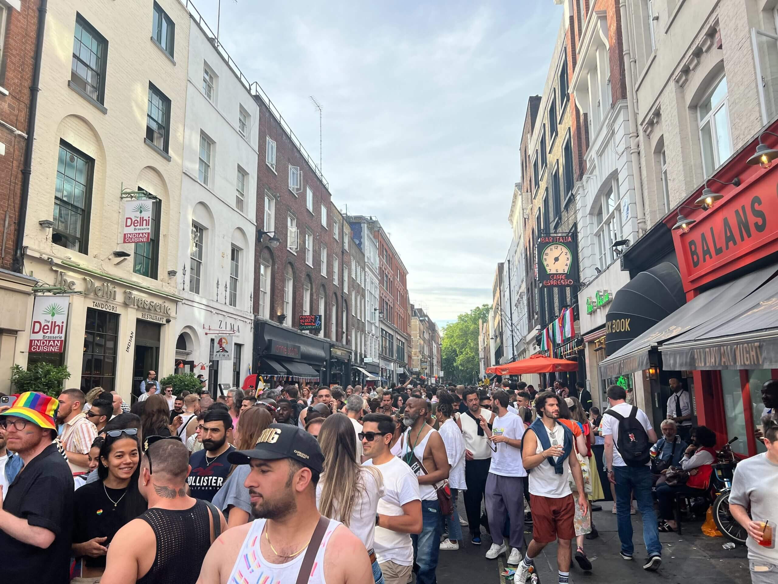 People celebrate Pride outside Bar Italia