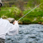 Angler demonstrating Euro nymphing technique