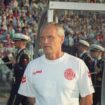 Richard Møller Nielsen on the touchline during Euro 1992, demonstrating his coaching prowess and tactical acumen.