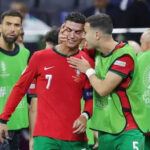 Cristiano Ronaldo crying on the field, reflecting the pressure of high expectations.