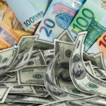 Close-up of euro banknotes with varying denominations