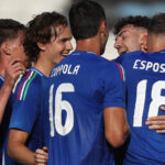 Pio Esposito (right) celebrates one of his four goals for Italy against San Marino
