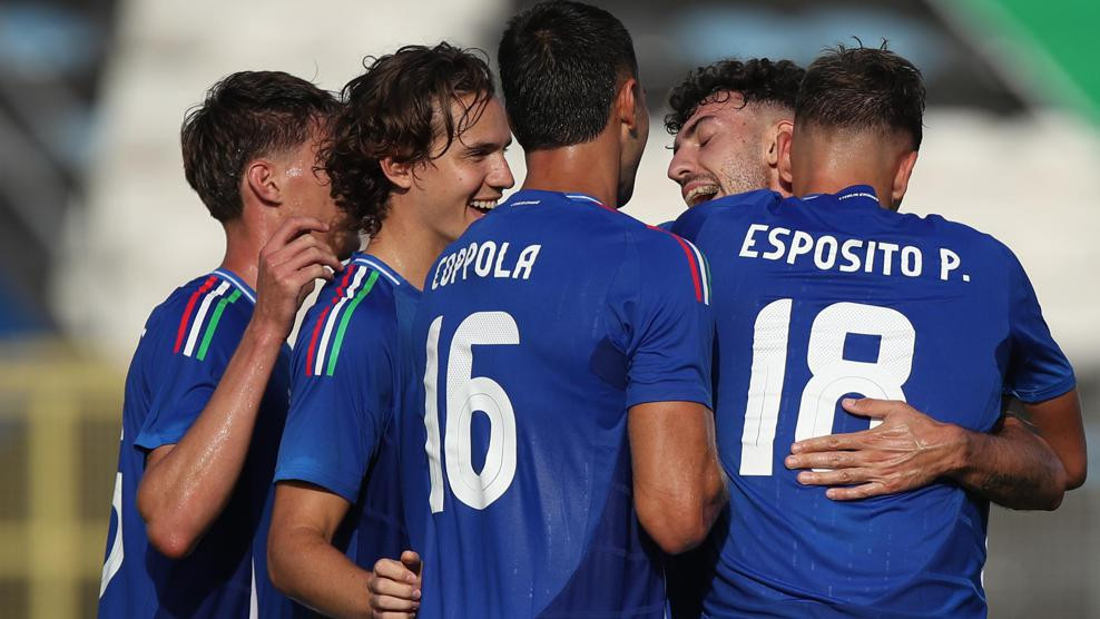 Pio Esposito (right) celebrates one of his four goals for Italy against San Marino